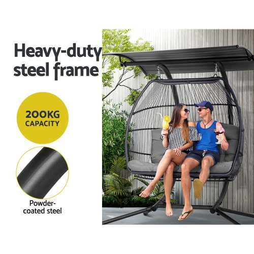 Grey egg chair with canopy